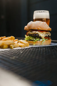 Close-up of fast food with drink