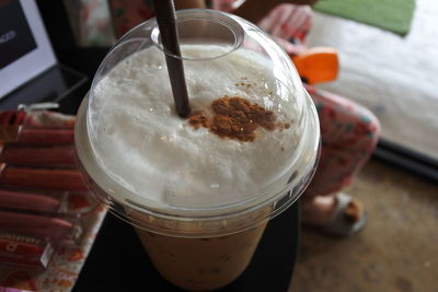 High angle view of coffee cup on table