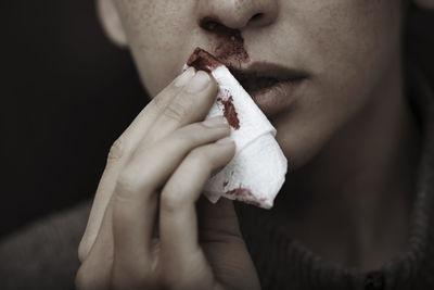 Close-up of man eating food