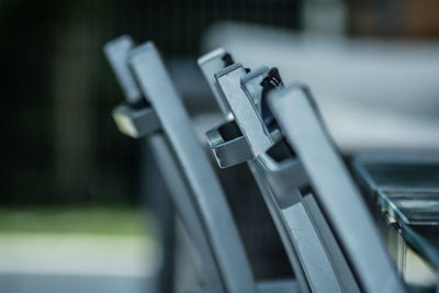 Close-up of metal chairs