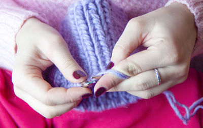 Close-up of woman holding hands