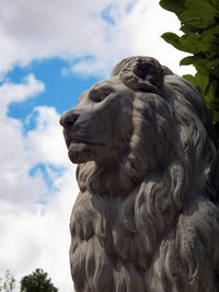 Low angle view of statue against sky