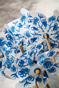 Close-up of blue pinwheel toys for sale