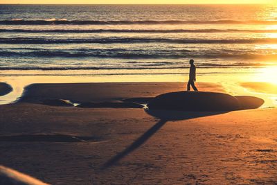Scenic view of sea during sunset