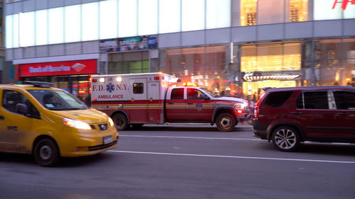 Cars on road in city