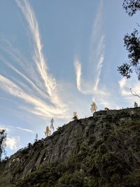 Low angle view of rocks against sky