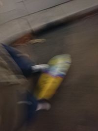 Low section of man standing on floor