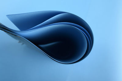 Close-up of computer mouse on blue background