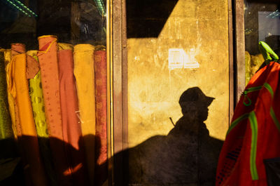 Shadow of people on glass window