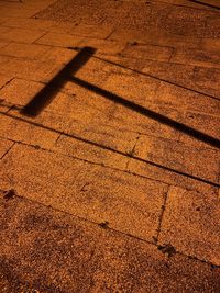 High angle view of shadow on street