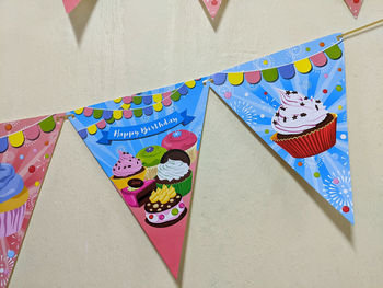 High angle view of multi colored paper on table