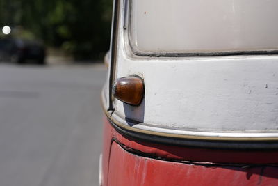 Close-up of vintage car on street