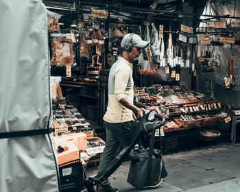 Side view of people working at construction site