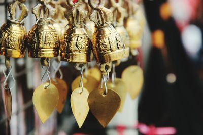 Close-up of bells for sale in market