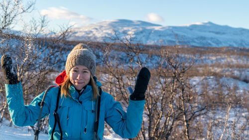 Portrait of woman in snow