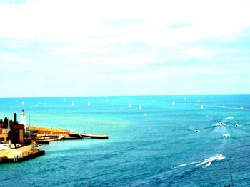 Scenic view of sea against blue sky