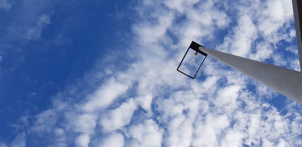 Low angle view of basketball hoop against sky