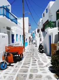 View of street amidst buildings in city