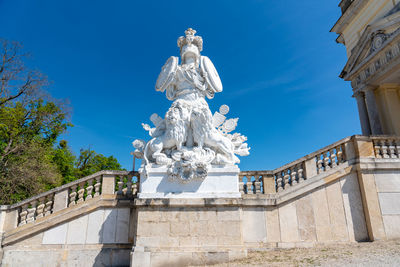 Low angle view of statue against sky