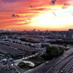 High angle view of cityscape against sky during sunset