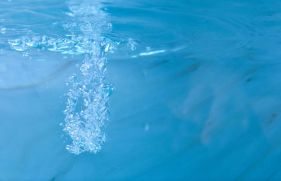 Close-up of water splashing in swimming pool