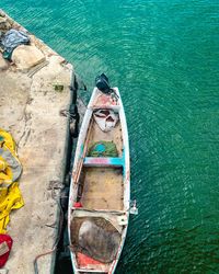 High angle view of boat moored on sea shore