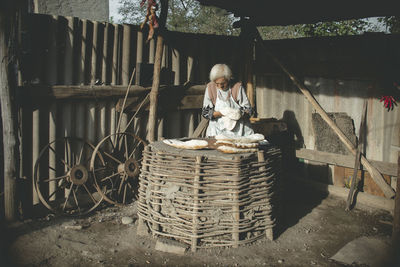 Man working in basket