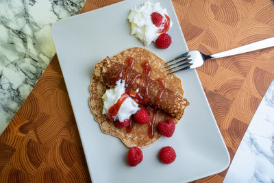 High angle view of dessert in plate on table