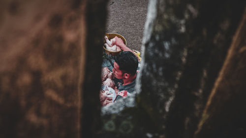 High angle view of girl on wall