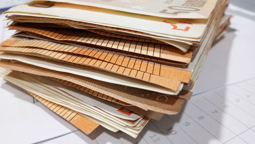 Close-up of currency on table