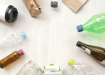 High angle view of bottles on table