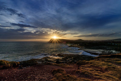 Scenic view of sea against sky during sunset