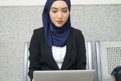 Young woman looking at camera