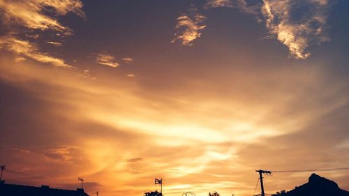 High section of dramatic sky at sunset