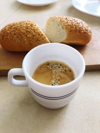Close-up of coffee cup on table