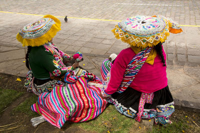 Rear view of woman with umbrella