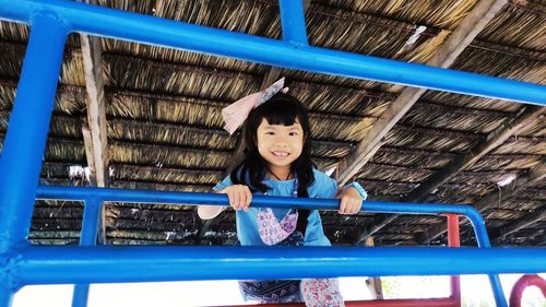 Portrait of cute girl smiling in park