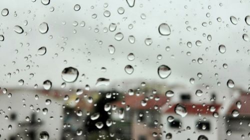 Close-up of raindrops on window