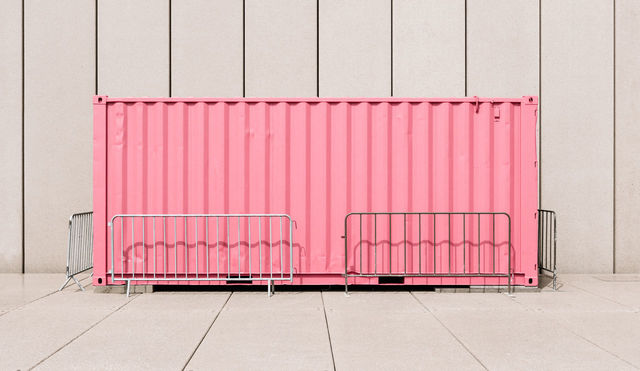 Cargo container against wall | ID: 83336815