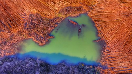 High angle view of volcanic landscape against sky