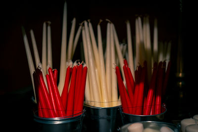 Close-up of red candles in temple