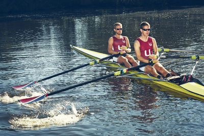 Young men canoeing