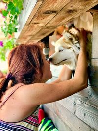 Woman with dog outdoors