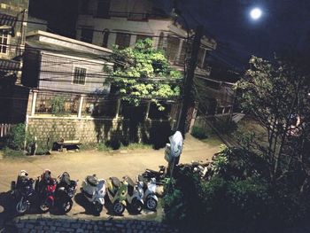 People in traditional building at night