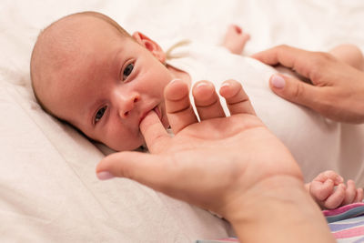 Cropped image of mother holding baby