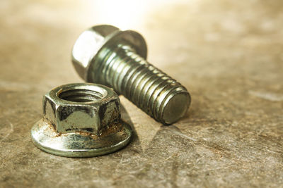 Close-up of rusty metal on table