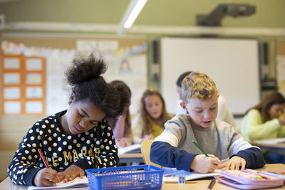 Girl and boy in classroom