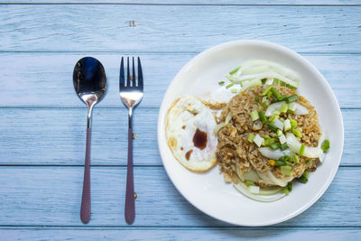 Directly above shot of breakfast served on table