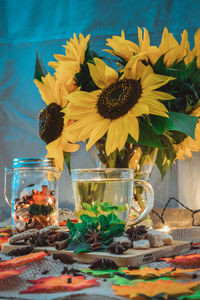 Close-up of sunflowers in vase on table