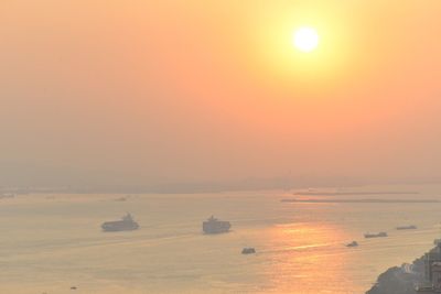 Scenic view of sea against sky at sunset